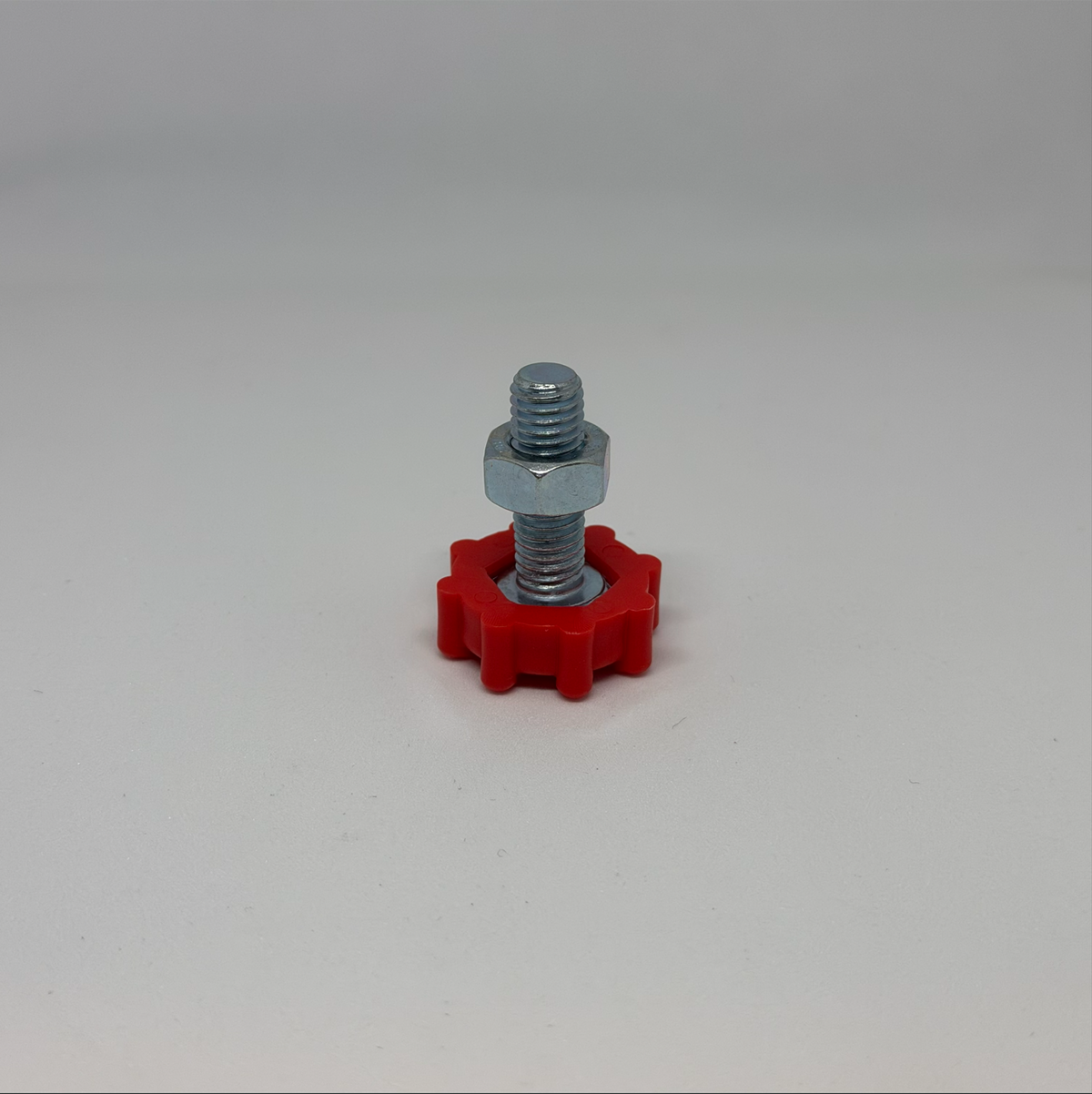 Höhenverstellschraube mit rotem Stellfuß und Mutter für MWH Tischfußkappe 47 x 31 mm